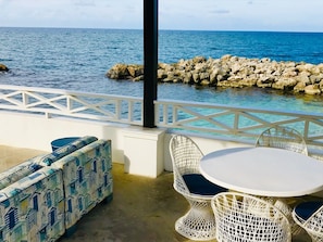 Lounge area overlooking sea cove