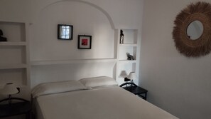 2 habitaciones, tabla de planchar con plancha, cuna de viaje y wifi 