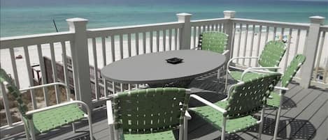 Enjoy a meal or relax with friends on this deck overlooking the ocean.