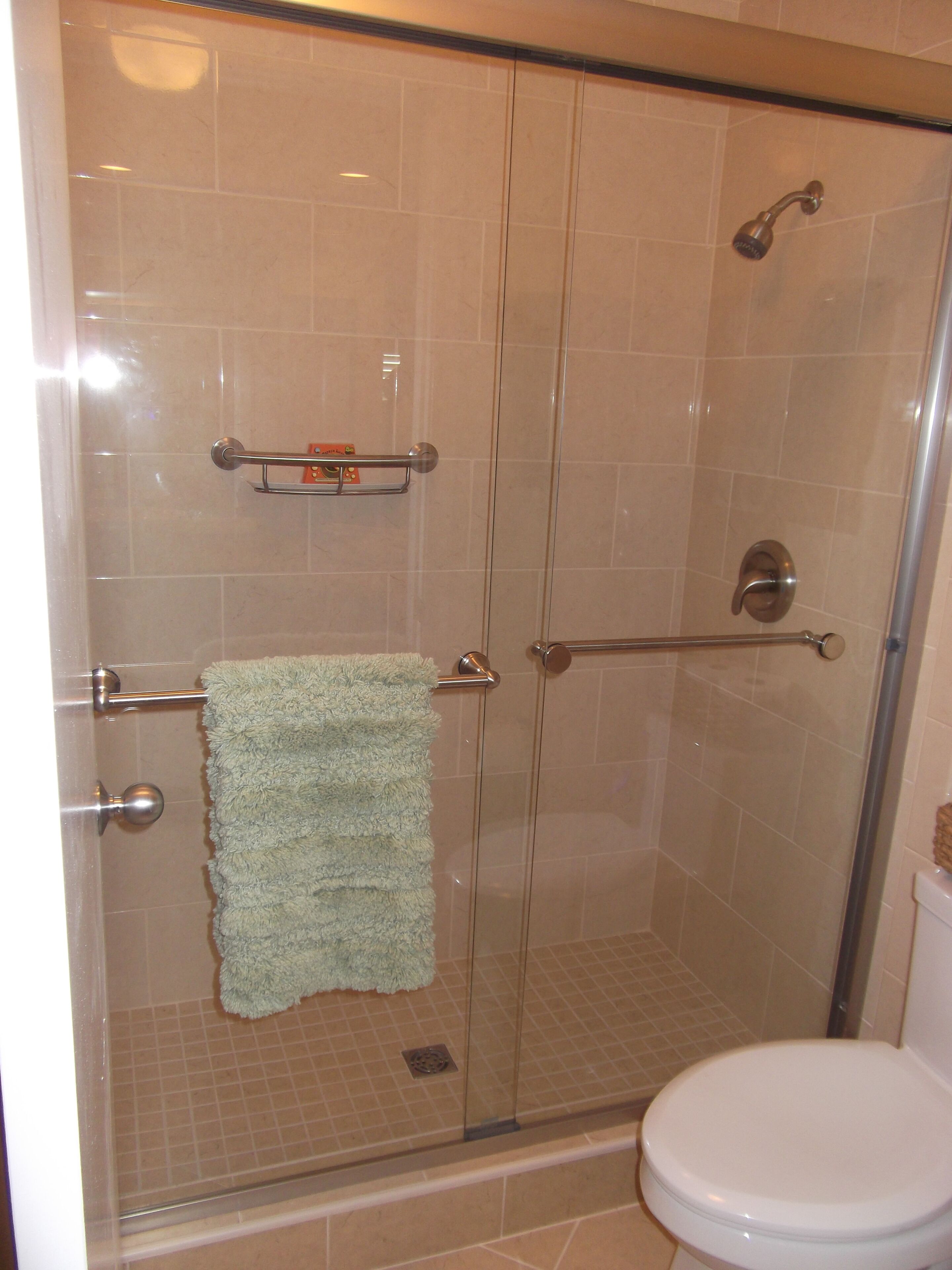 Combined shower/tub, hair dryer, towels, soap