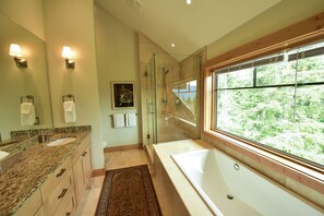 Bathtub, hair dryer, towels, soap