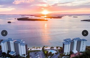On the beach, sun-loungers, beach towels - Beachfront Stunning Corner Condo-
Amazing Water views on Private Beach of Resort (Fort Myers)