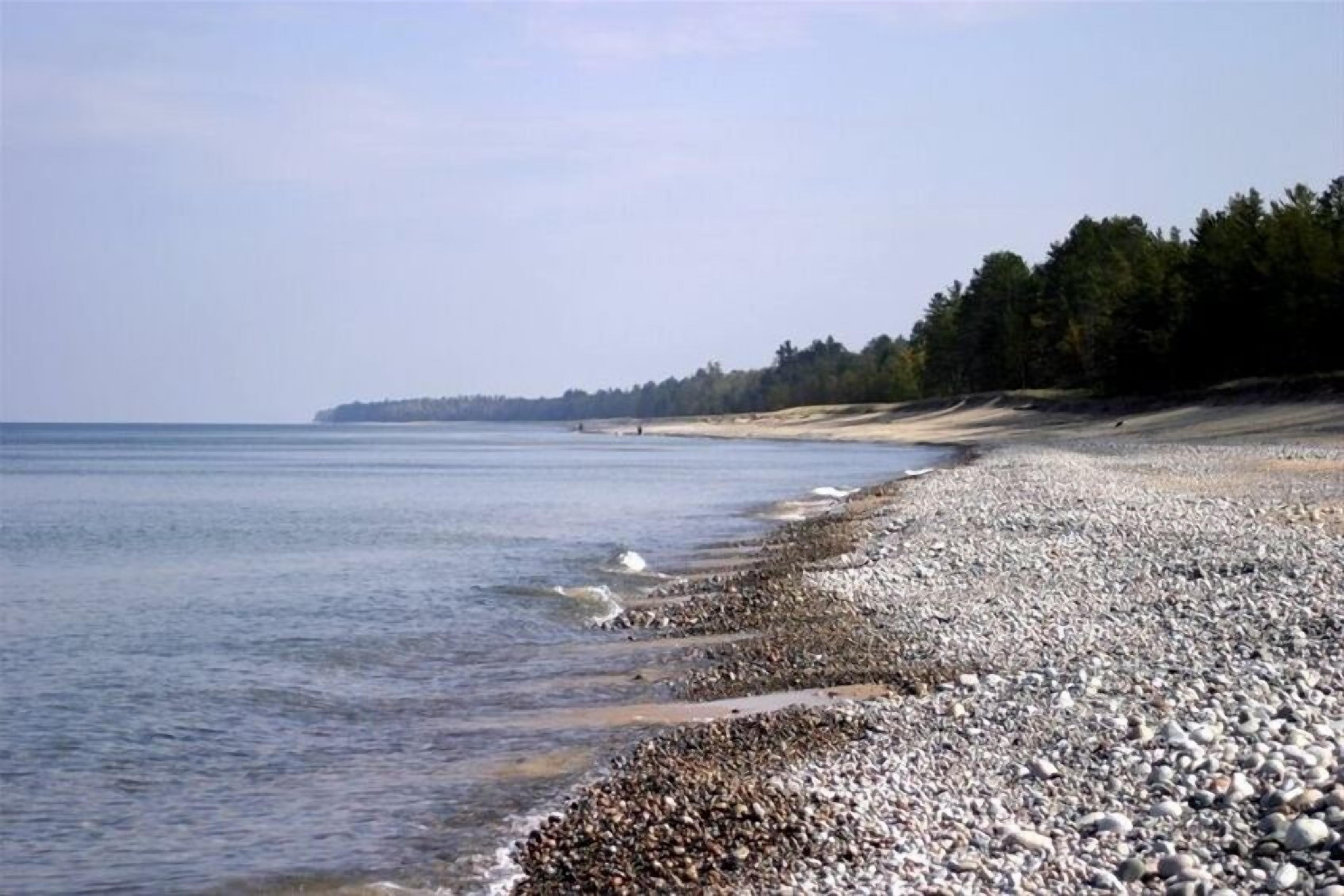 On the beach, sun loungers, beach towels