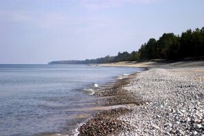 On the beach, sun loungers, beach towels
