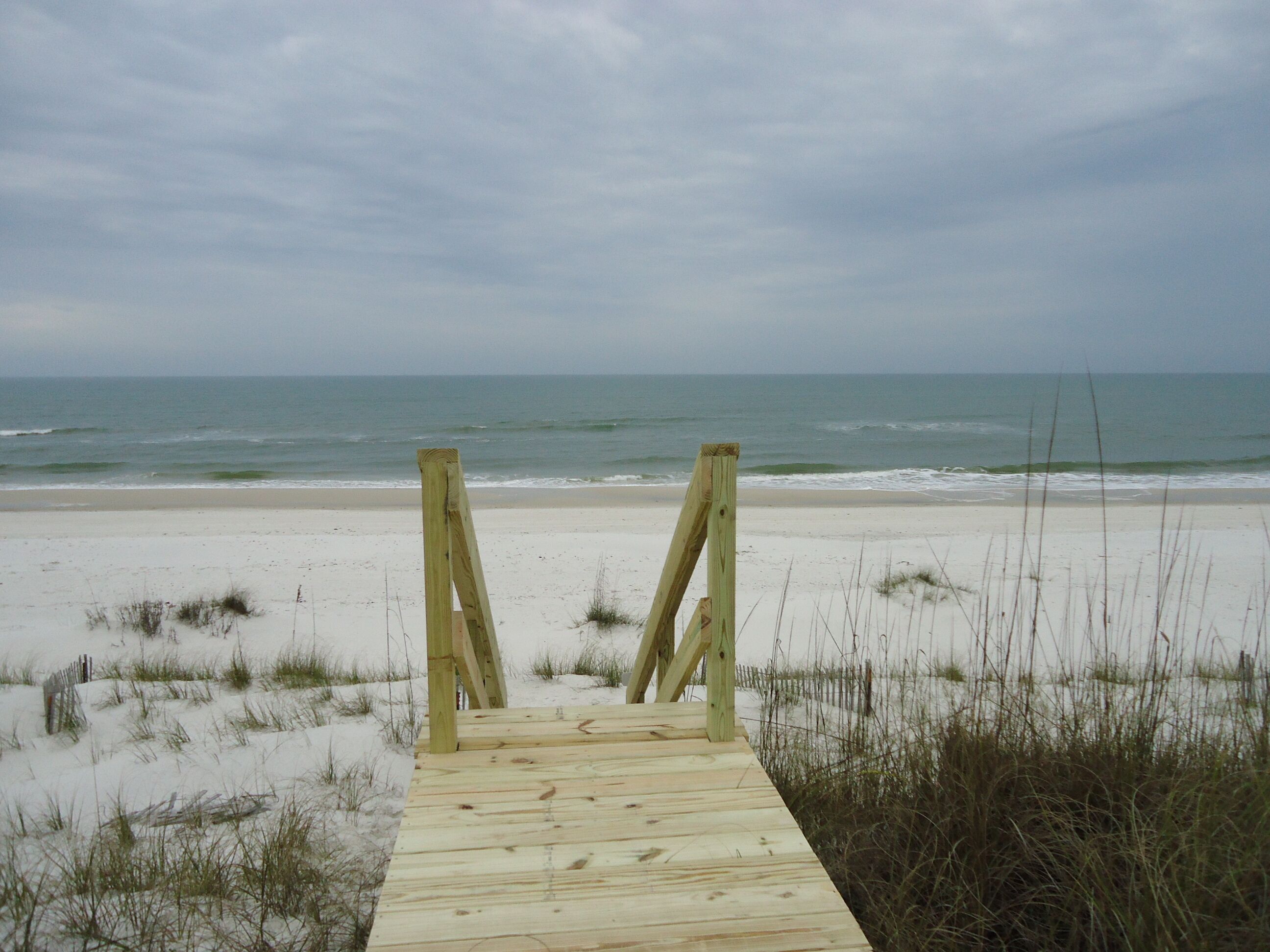 On the beach, sun-loungers