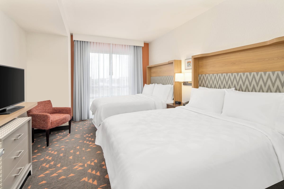Hypo-allergenic bedding, desk, blackout drapes, soundproofing
