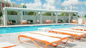Outdoor pool, open 9:00 AM to 10:30 PM, free pool cabanas