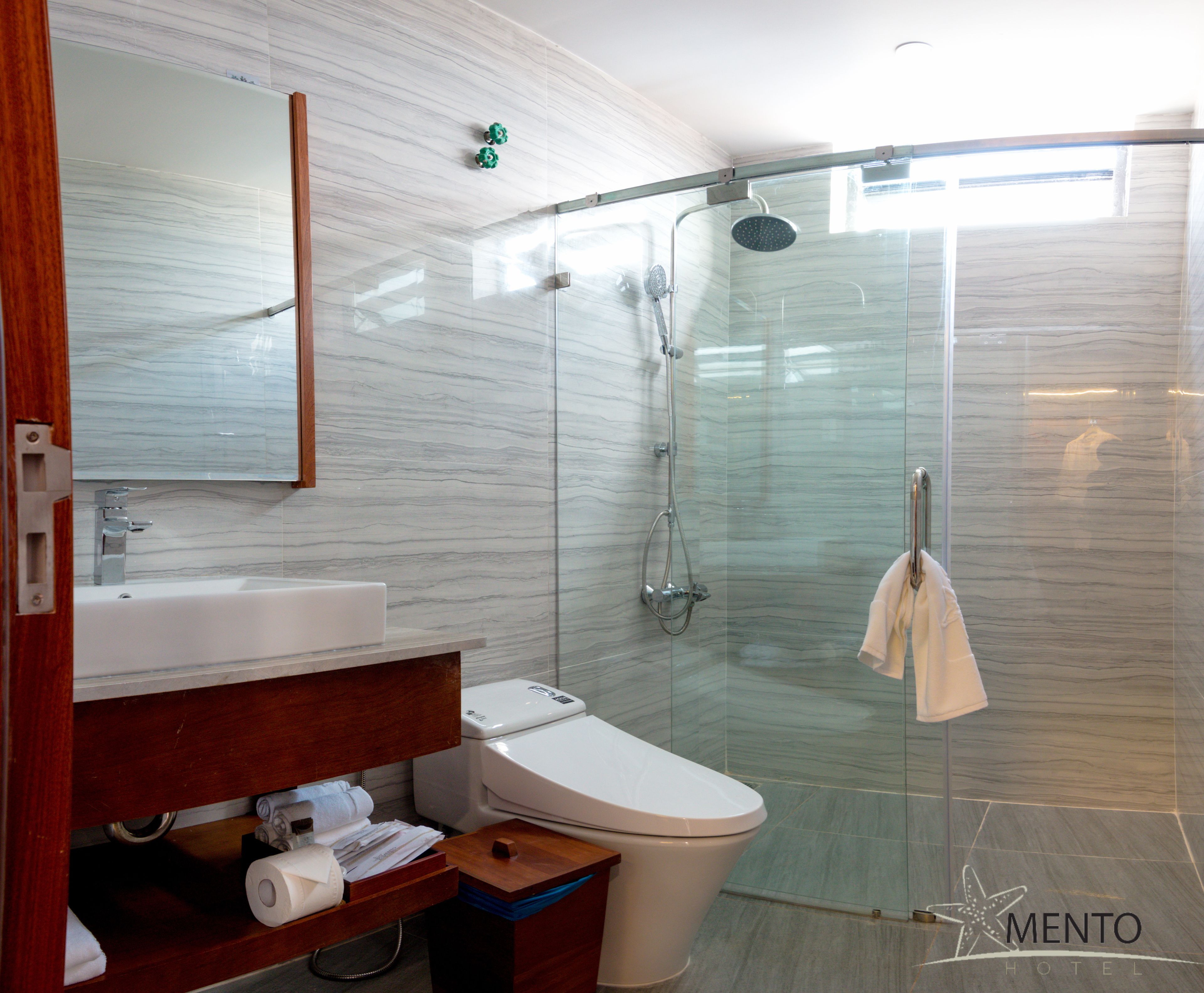 superior double room | bathroom | shower, designer toiletries, hair dryer, bathrobes