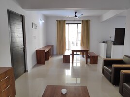 Comfort Apartment, 2 Bedrooms | Living area | 32-inch LCD TV with cable channels, TV