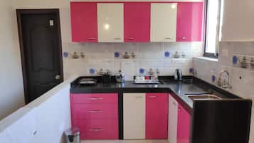 Comfort Apartment, 1 Bedroom | Private kitchen | Fridge, stovetop, coffee/tea maker, electric kettle