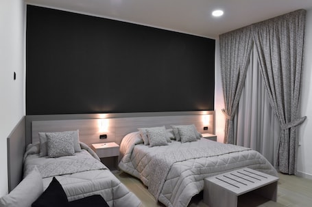 Superior Double or Twin Room, Multiple Beds, Non Smoking, City View | Minibar, in-room safe, individually decorated, individually furnished