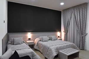 Superior Double or Twin Room, Multiple Beds, Non Smoking, City View | Minibar, in-room safe, individually decorated, individually furnished