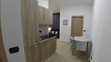 Junior Suite, 1 Double Bed with Sofa bed, Non Smoking | Private kitchenette | Full-size fridge, microwave, cookware/dishes/utensils