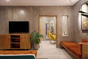 Habitación doble ejecutiva de uso individual, 1 habitación, para no fumadores, refrigerador | Área de sala de estar | Smart TV de 54 pulgadas con canales por cable, televisión y Netflix 