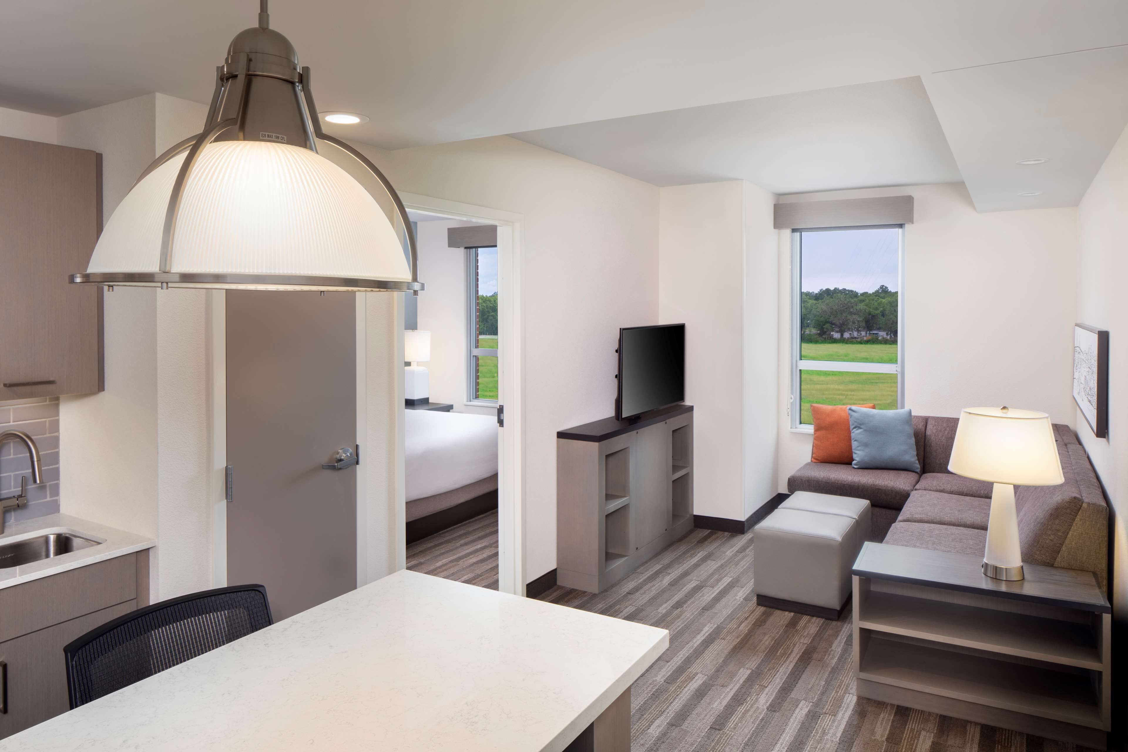 one bedroom suite, king bed with sofa bed | premium bedding, desk, laptop workspace, blackout curtains