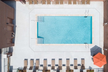 Outdoor pool, open 9:00 AM to 9:00 PM, pool umbrellas, sun loungers at Hyatt House Charleston / Mount Pleasant