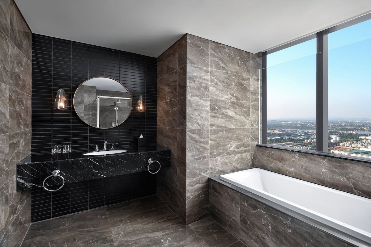 combined shower/bathtub, free toiletries, hair dryer, bathrobes