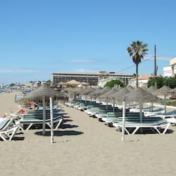 Beach nearby, white sand, sun loungers, beach umbrellas