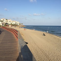 Beach nearby, white sand, sun loungers, beach umbrellas