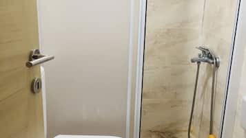 Luxury Apartment, 1 Bedroom, City View | Bathroom | Shower, hydromassage showerhead, free toiletries, hair dryer