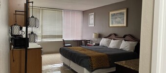 Apm Inn & Suites
