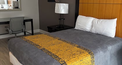 Apm Inn & Suites