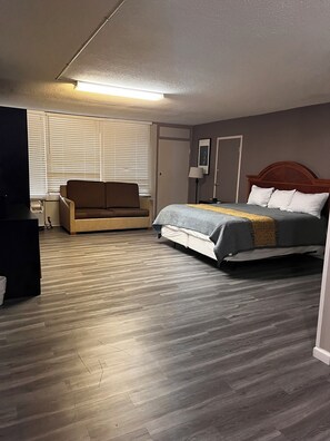 Habitación individual Deluxe | Escritorio, wifi gratis, ropa de cama