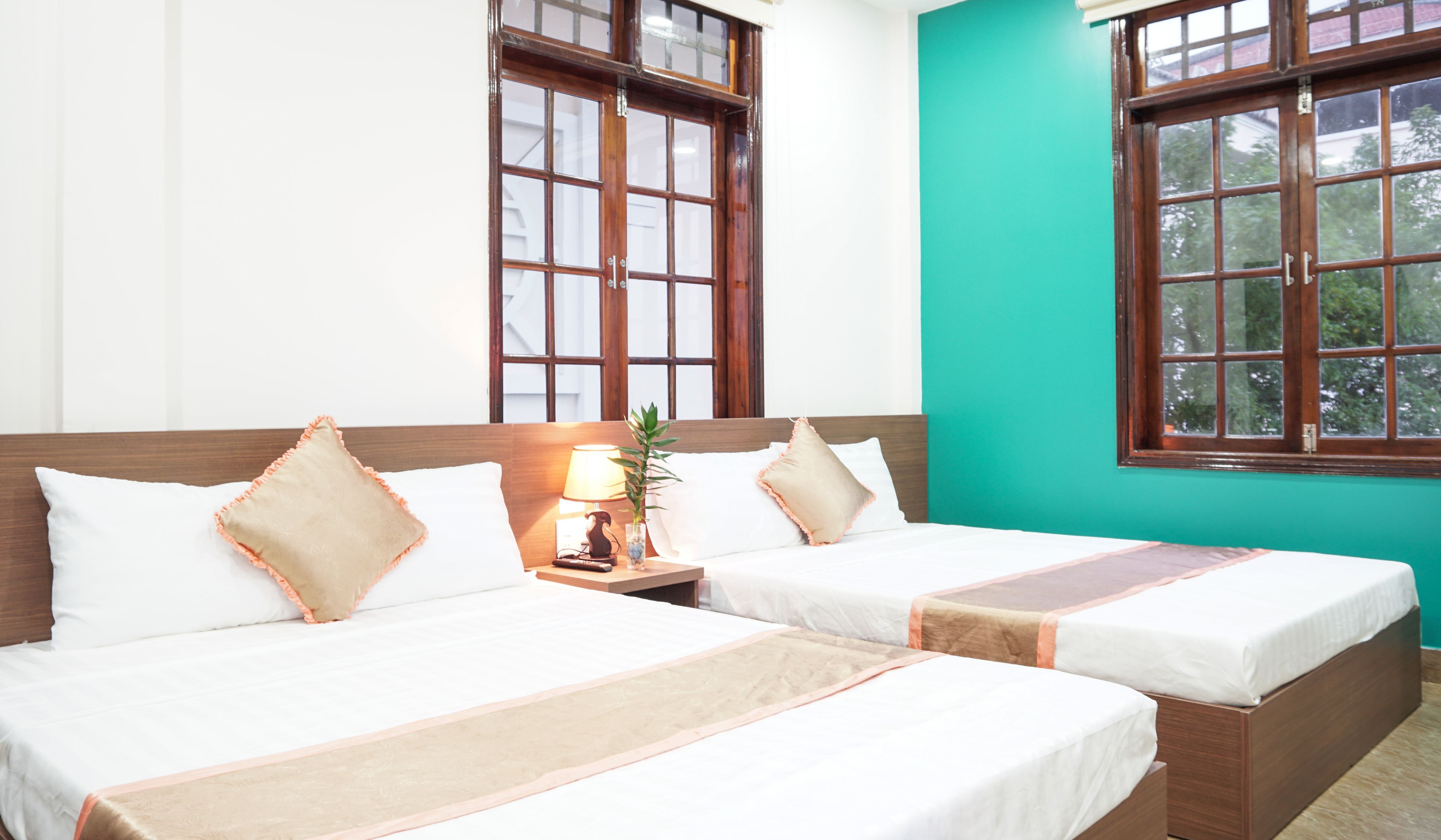 Deluxe Quadruple Room, 2 Double Beds | Minibar, desk, blackout curtains, soundproofing