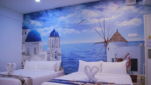 A hotel room with two beds, a mural of a coastal scene, and a seagull in the sky. - Santorini Hotel Melaka (Malacca City)