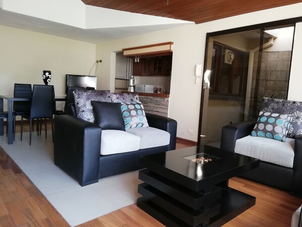 Deluxe House, Multiple Beds, Accessible, Non Smoking | Living area | 32-inch LED TV with digital channels, TV, fireplace