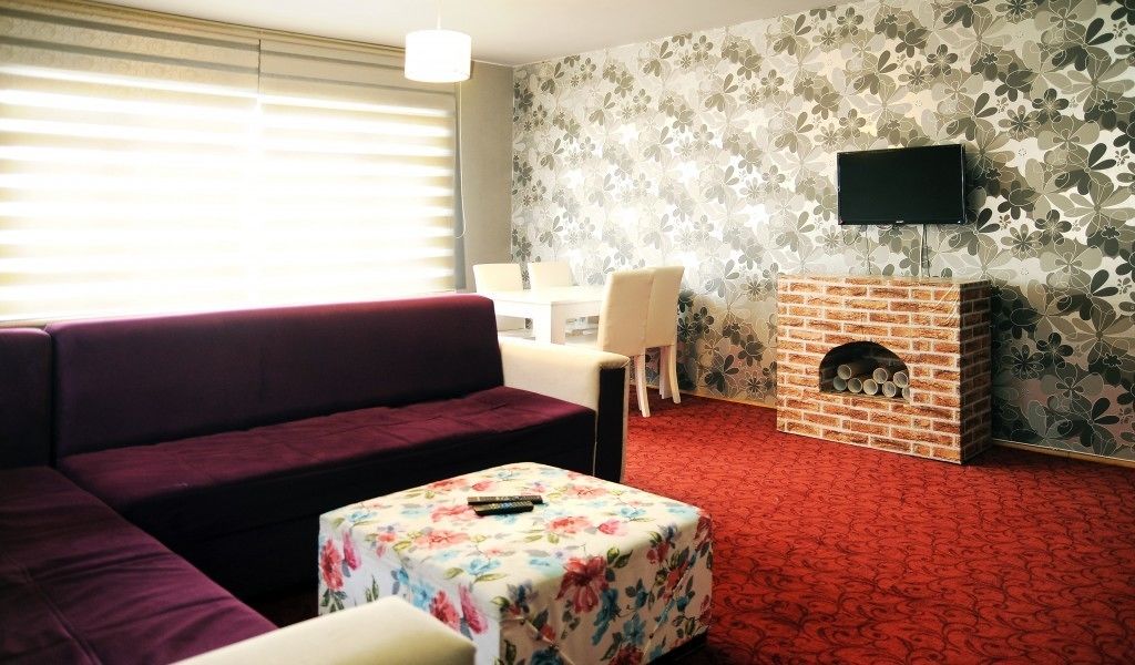 Family Apartment, Smoking, City View | Living area | LCD TV