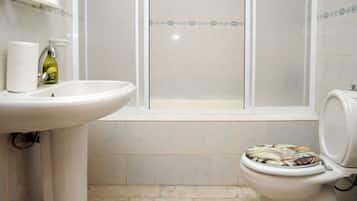 Family Apartment, Smoking, City View | Bathroom | Shower, free toiletries, hair dryer, slippers