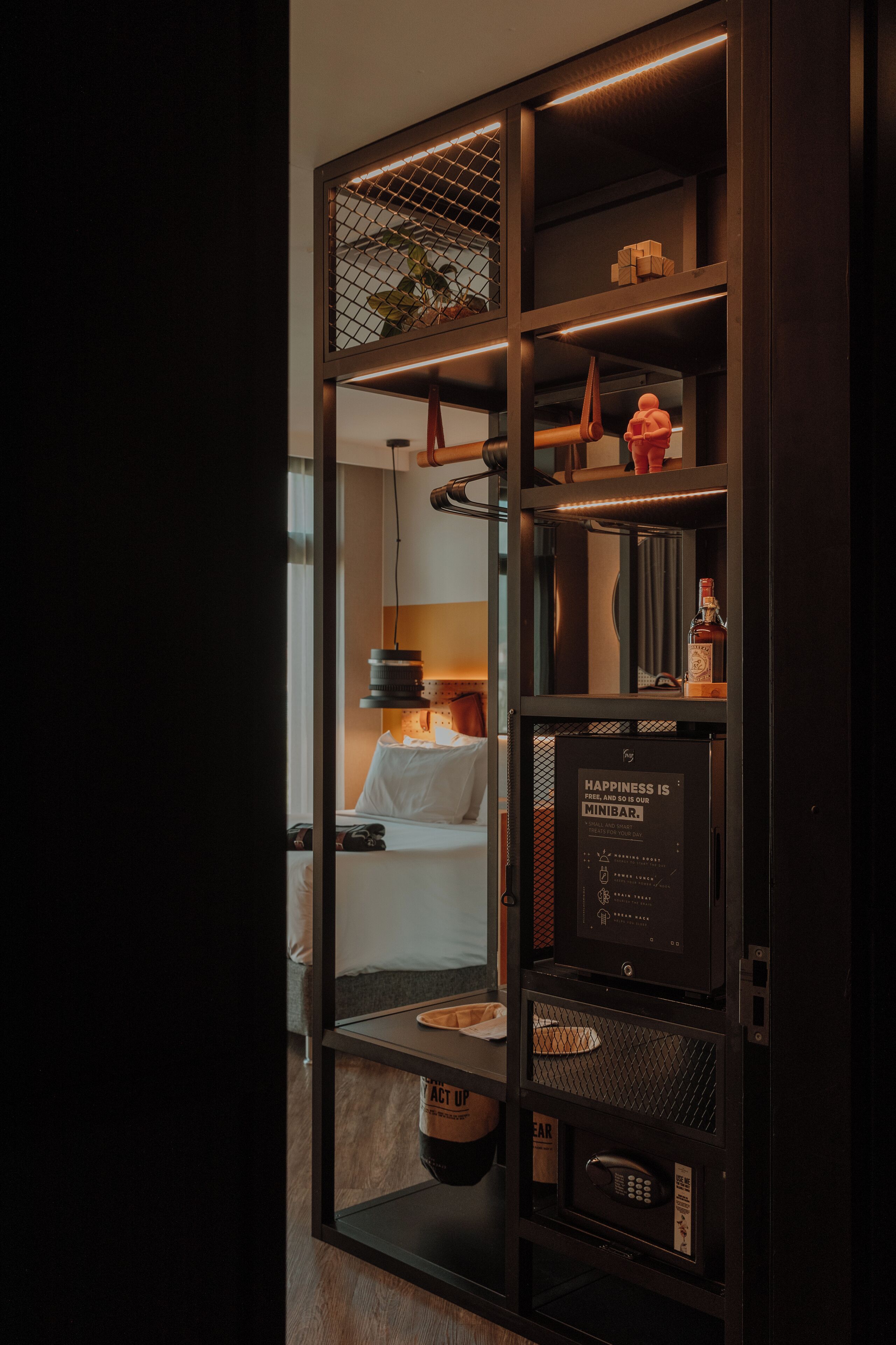 Economy Room (XS) | Minibar, in-room safe, desk, blackout drapes
