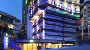 A multi-story hotel with a modern design, featuring balconies and a prominent signage for "ibis Styles Hotel". - ibis Styles Istanbul Atasehir (Istanbul)