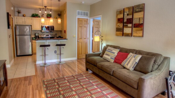 Premier Condo,1 Bedroom with Pool Access | Living area | Flat-screen TV, DVD player