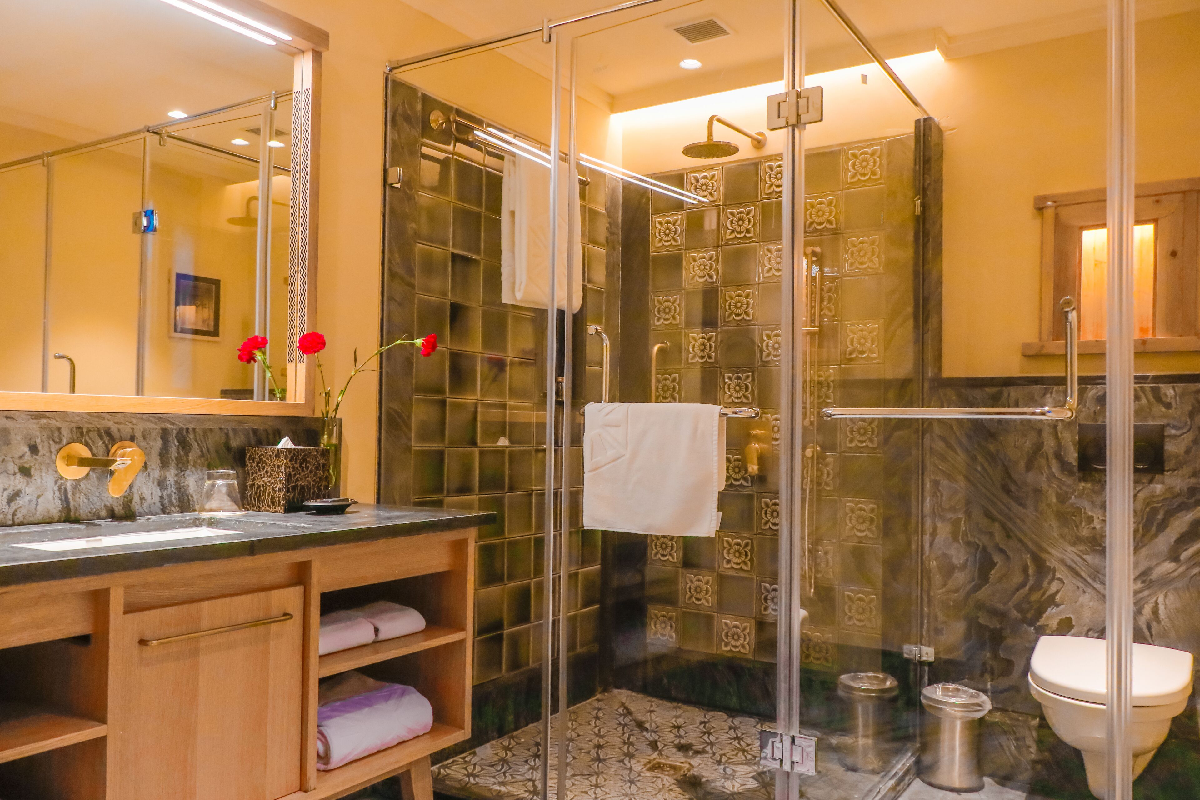 shower, rainfall showerhead, designer toiletries, hair dryer