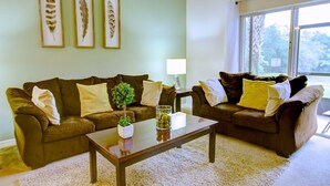 Premium 3 Bedroom VIlla with Pool Access | Living area | 42-inch flat-screen TV with cable channels, TV - York Condo at Oakwater Resort (Kissimmee)