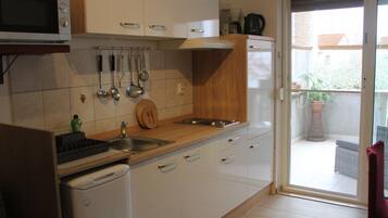 Economy Apartment, 1 Bedroom, Terrace, Ground Floor | Private kitchen | Mini-fridge