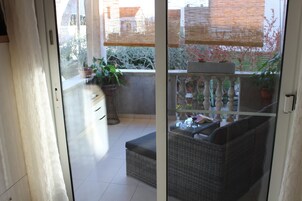 Apartamento econômico, 1 quarto, terraço, no piso térreo | Terraço/pátio