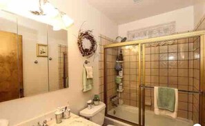 Bathtub, hair dryer, towels, soap