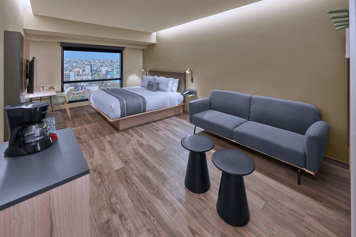 Superior Room, 1 King Bed with Sofa bed | Premium bedding, down comforters, pillowtop beds, in-room safe