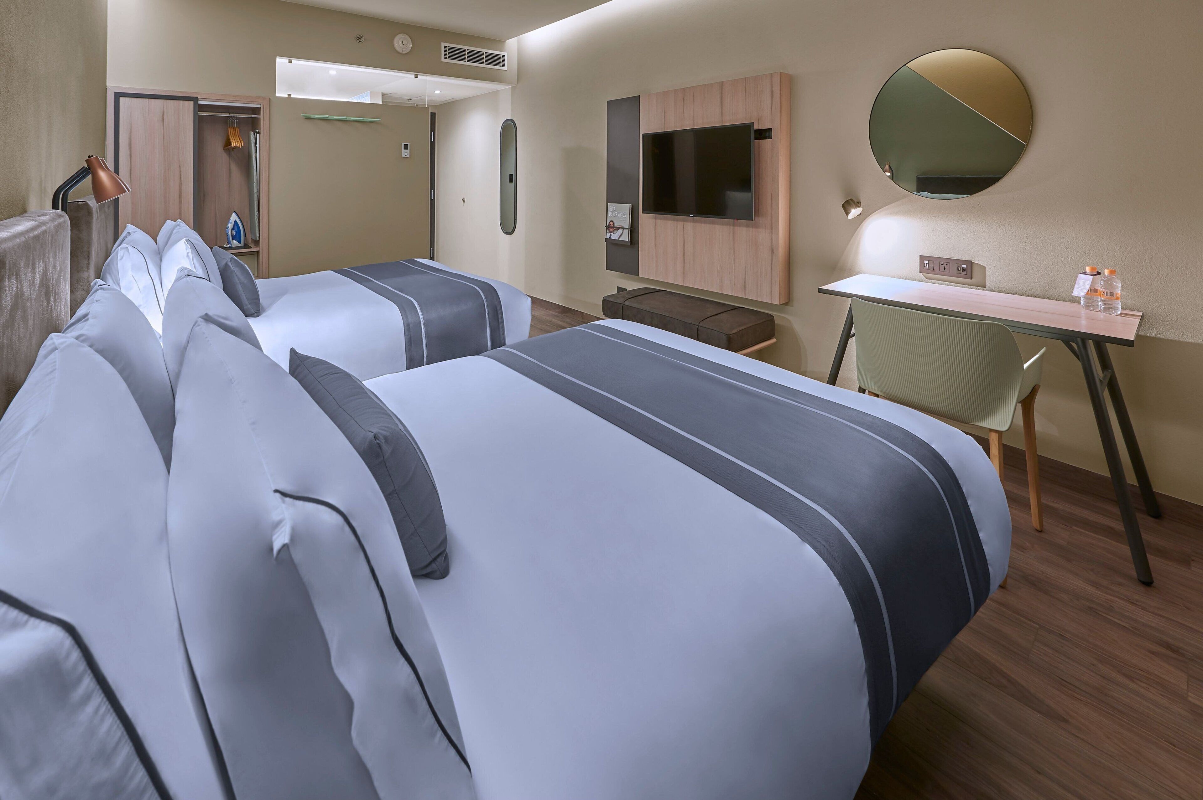 premium bedding, down duvets, pillow-top beds, in-room safe