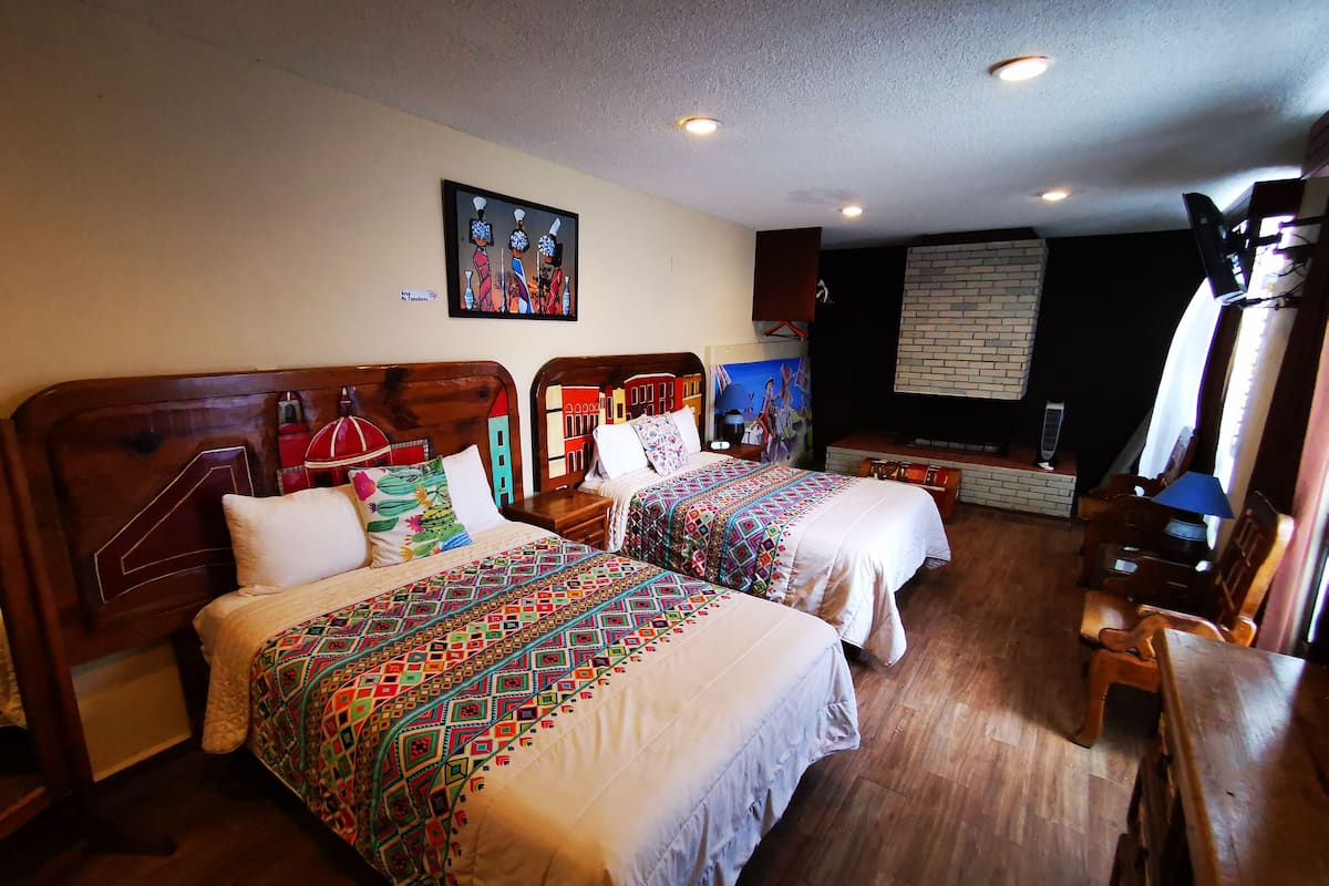Exclusive Quadruple Room, 2 Double Beds, Non Smoking (Blanco) | Premium bedding, down comforters, individually decorated