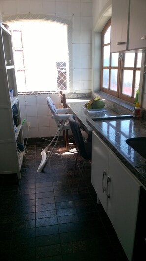 Fridge, oven, stovetop, high chair
