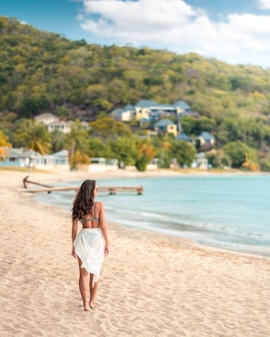 On the beach, sun-loungers, beach towels