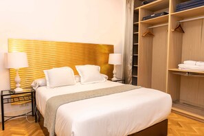 3 habitaciones, tabla de planchar con plancha, wifi y ropa de cama