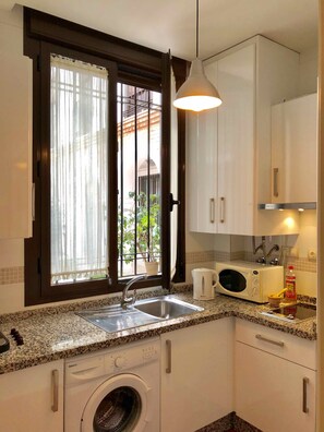 Fridge, microwave, coffee/tea maker, electric kettle