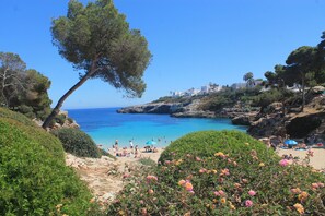 On the beach, sun-loungers, beach towels - Luxury Beachfront Villa on the beach, 40M to town. Private and peaceful. Bliss (Santanyí)
