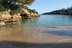 On the beach, sun-loungers, beach towels
