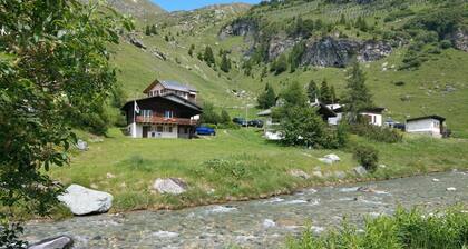 Detached house on the river within walking distance of the village and ski lifts